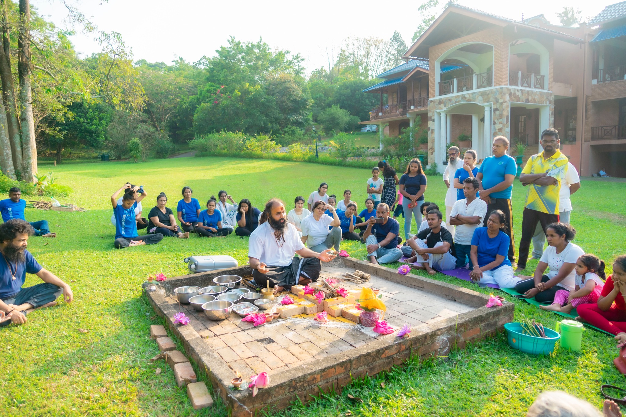 Group of participants attending a spiritual ceremony led by Rev. Chameera Sampath