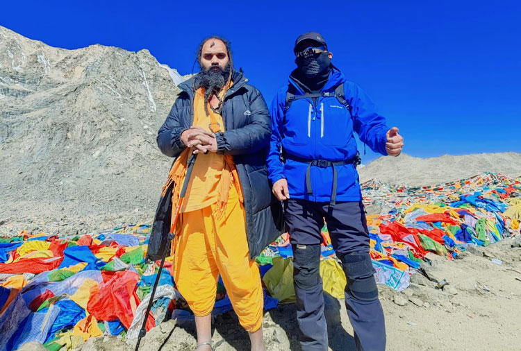 Small lake surrounded by prayer flags on Kailash Mansarovar Yatra.