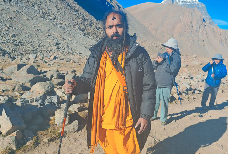 Pilgrim on Kailash Kora trek near Mount Kailash